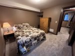 Lower level bedroom 3 with queen bed